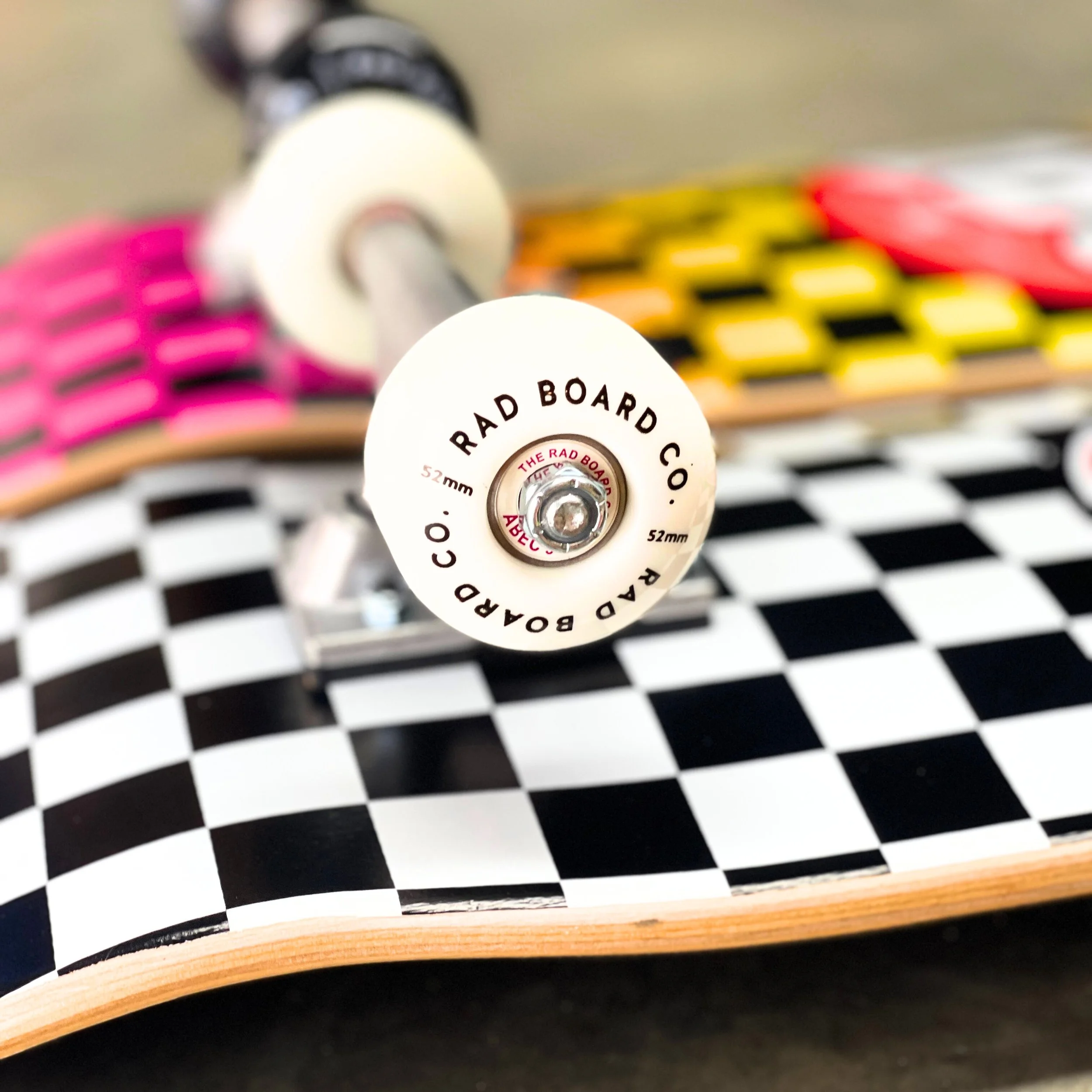 RAD BOARD CO. CHECKERS DUDE CREW COMPLETE NEON FADE 7.75 — SURF TRAX™